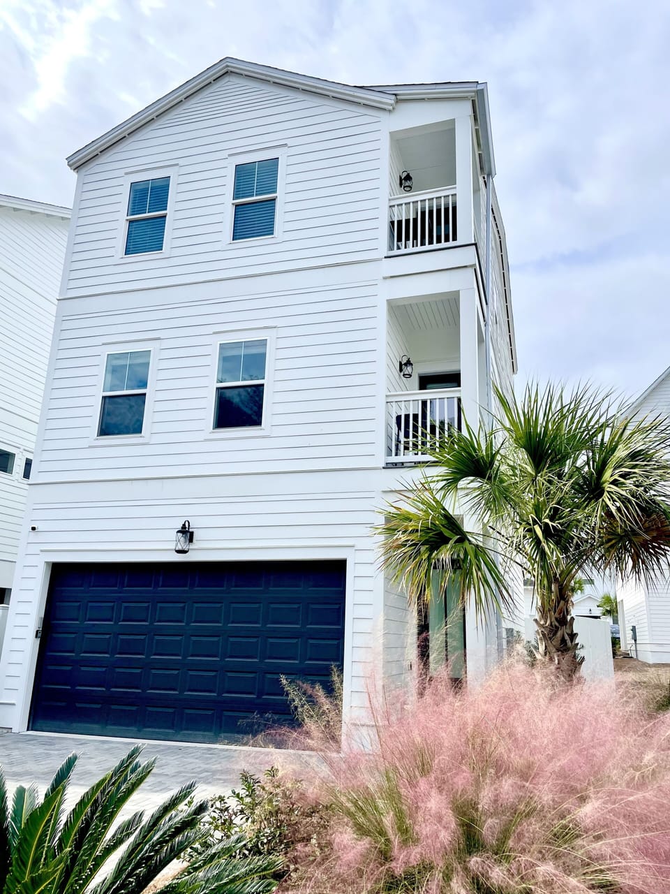 Keyless access & parking for 4 vehicles (2 inside garage & 2 on driveway pavers)