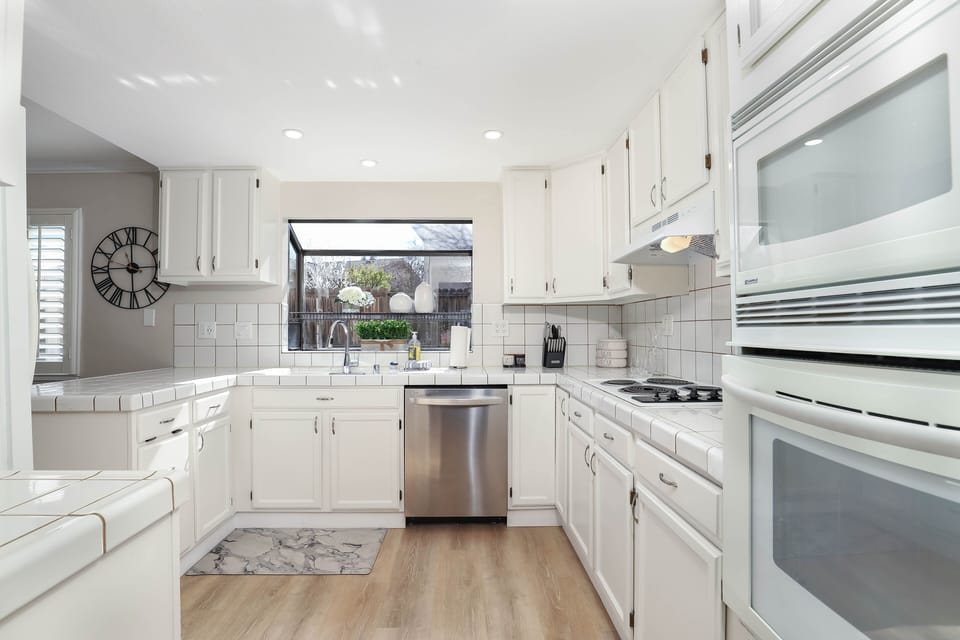 Nice, clean, open, & energetically lite kitchen to start your day off !
