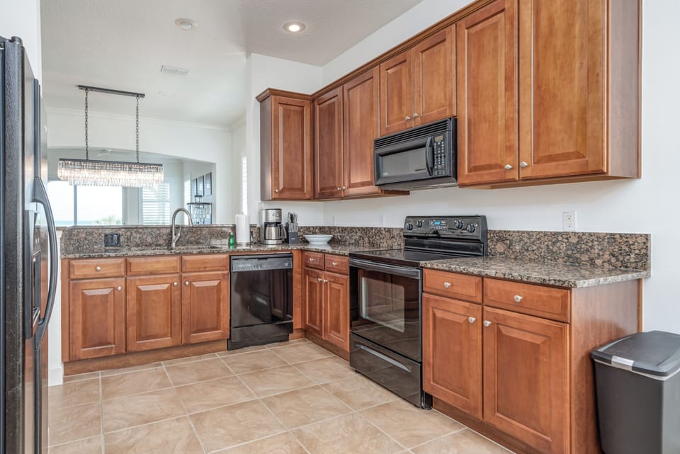 The kitchen is also connected to the other living spaces.