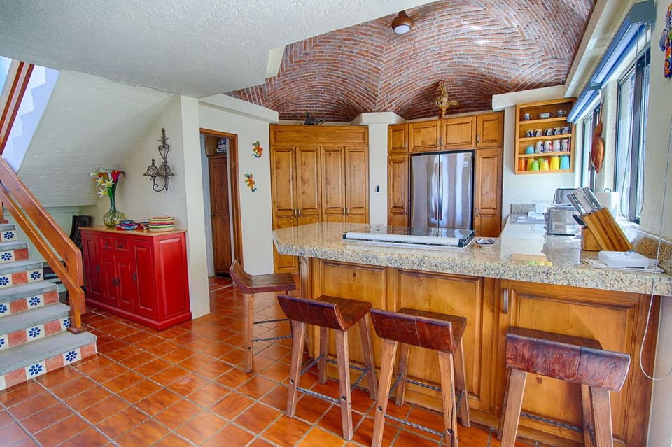 Spacious kitchen with wrap around island