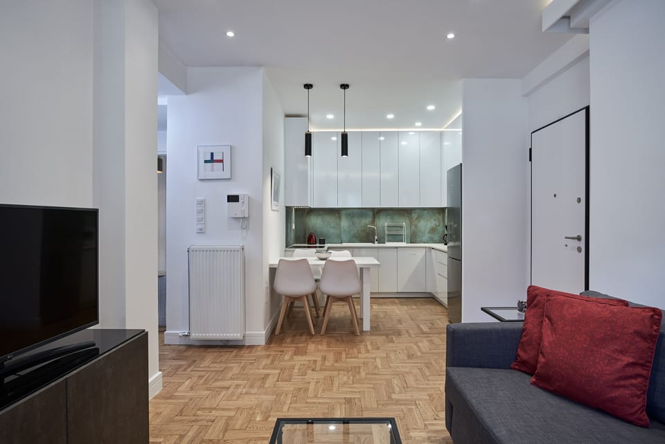Comfort Apartment | Living area | Flat-screen TV
