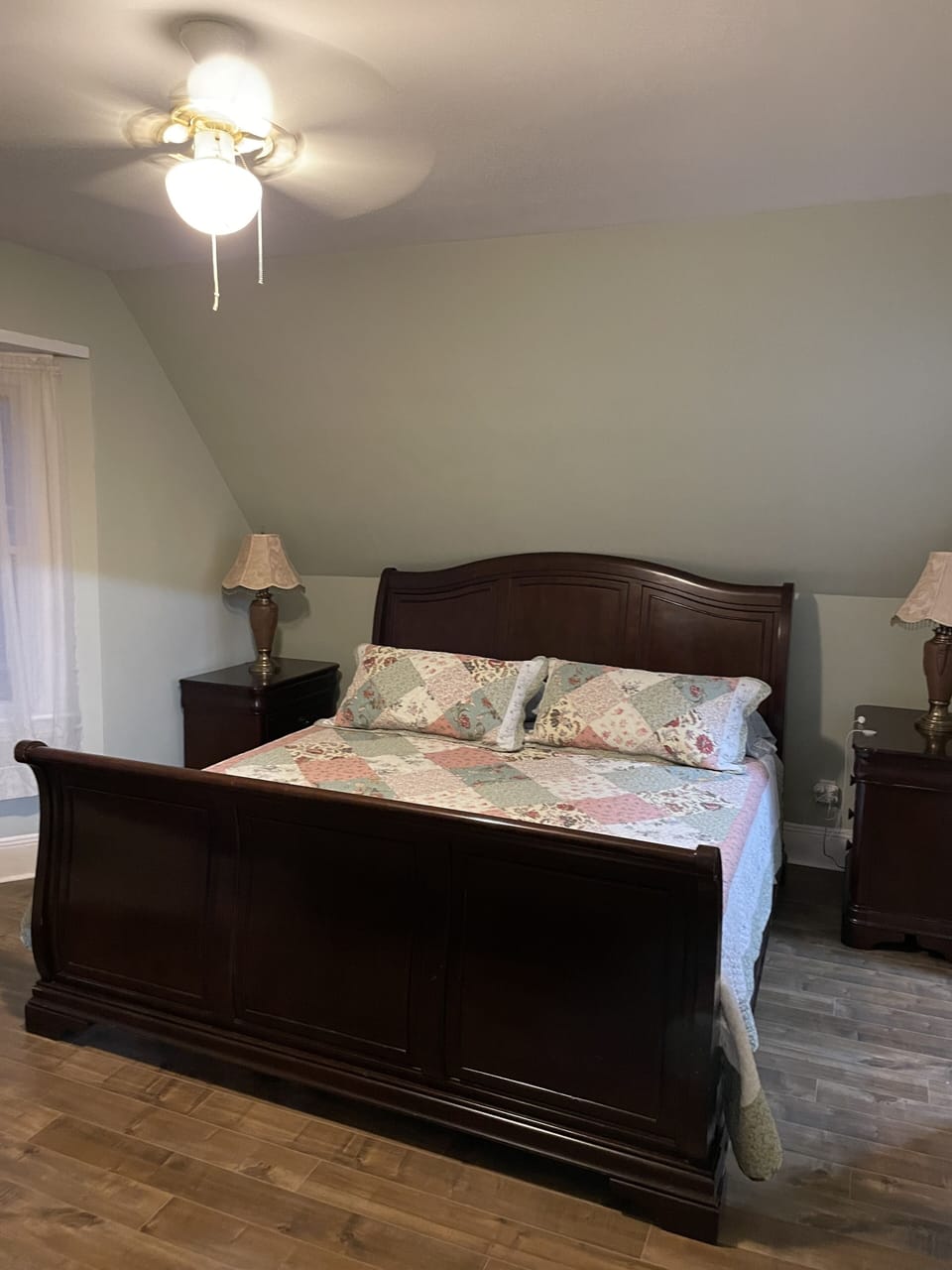 Master bedroom with king bed and an ensuite powder room