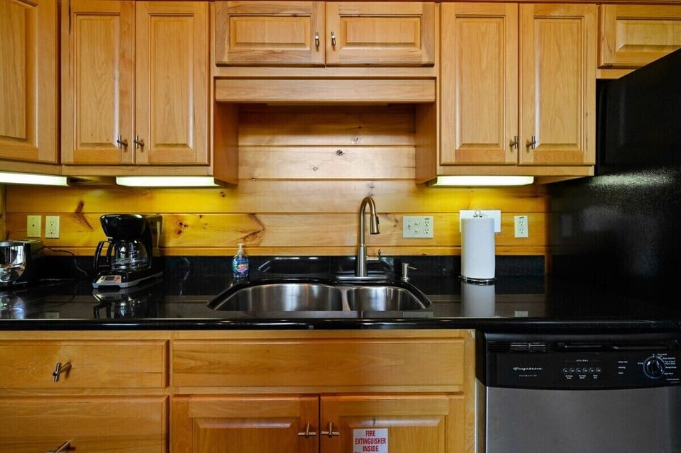 Create unforgettable meals surrounded by mountain charm, sleek appliances, and inviting cabin warmth.