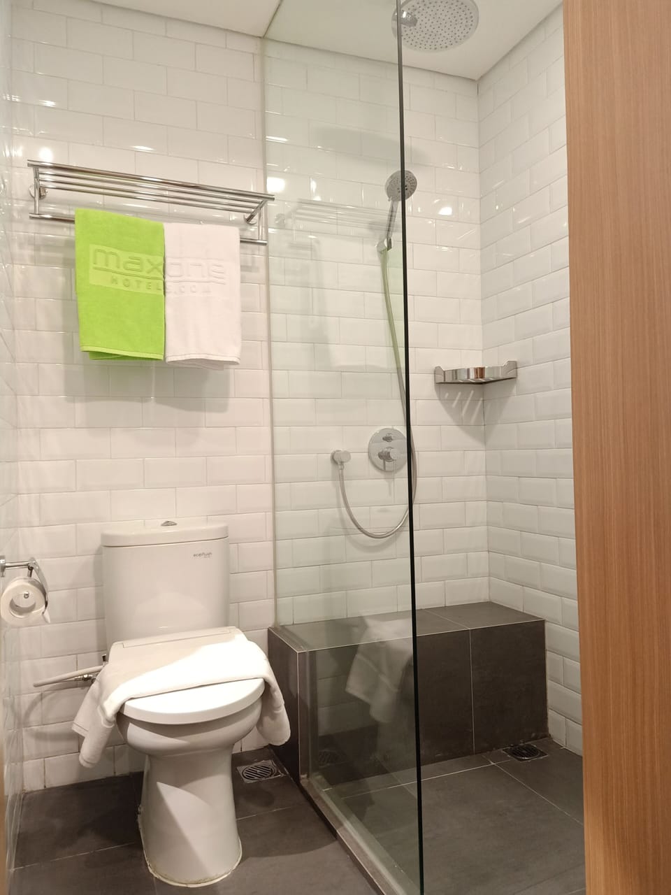 Shower, rainfall showerhead, towels, soap