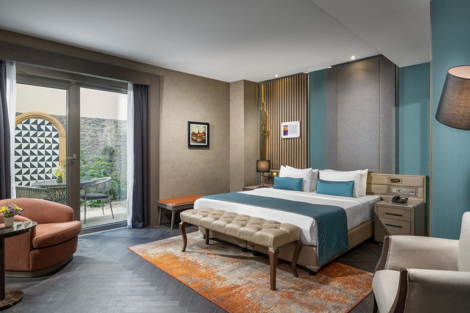 Double Room (Garden) | Minibar, in-room safe, desk, laptop workspace
