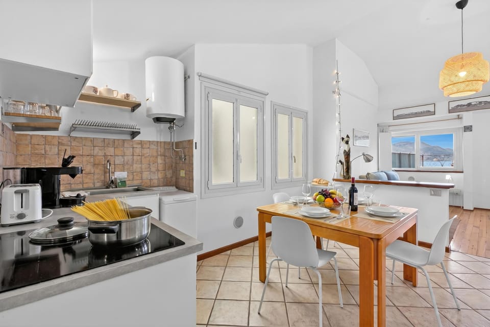 Family Penthouse, Multiple Bedrooms, Beachside (Rooftop On Stresa Lake View) | Private kitchenette | Fridge, oven, stovetop, coffee/tea maker