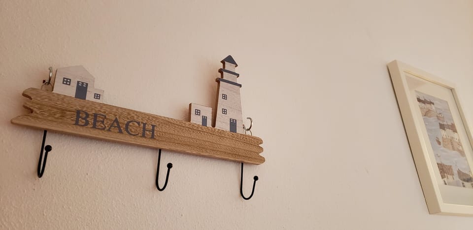 There are nautical themed touches throughout such as this set of coat hooks
