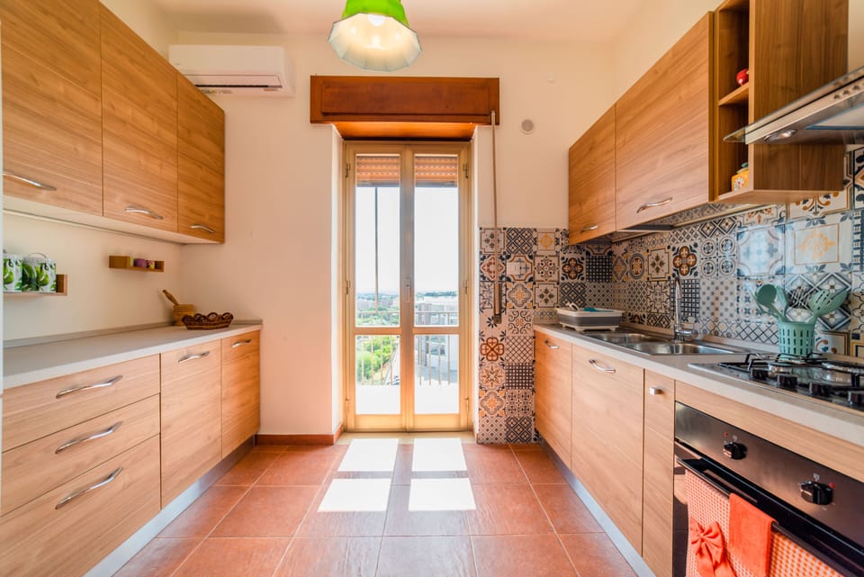 Apartment | Private kitchen | Full-size fridge, microwave, oven, stovetop
