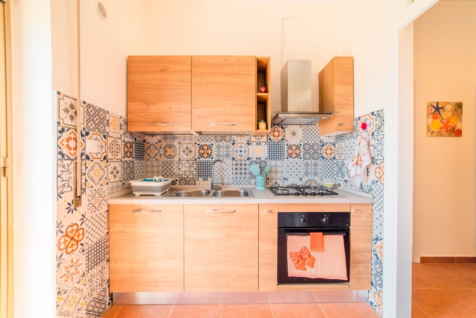Apartment | Private kitchen | Full-size fridge, microwave, oven, stovetop