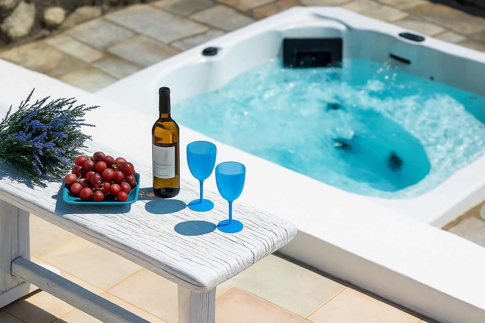 Villa Exterior with Jacuzzi – Total Privacy
Outdoor spa area offering relaxation, luxury, and unforgettable sunset moments.
