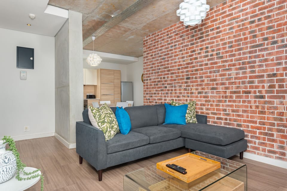 Classic Apartment | Living area | 40-inch flat-screen TV with satellite channels, TV, Netflix