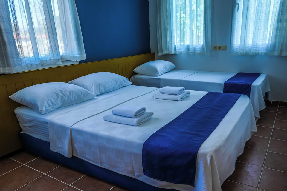 Economy Triple Room, Multiple Beds | Egyptian cotton sheets, premium bedding, laptop workspace, free WiFi