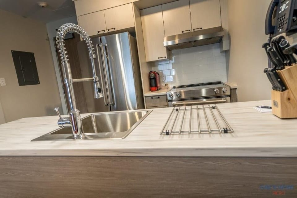 Prestige One - Bedroom Suite | Private kitchen | Coffee/tea maker, highchair, dining tables