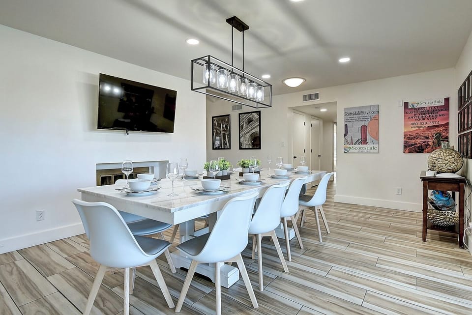 New quartz dining table sit 10 is absolutely gorgeous and has its own 70" TV.