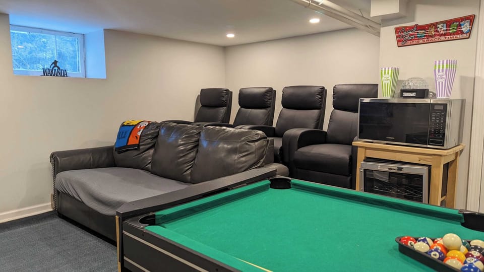 Bonus Room: Game Room & Home Theater! Enjoy a game room with a pool table, darts, basketball arcade game, and foosball table. Relax in the home theater with a queen pullout couch and 4 leather stadium seats with massage features. Additional fee applies.