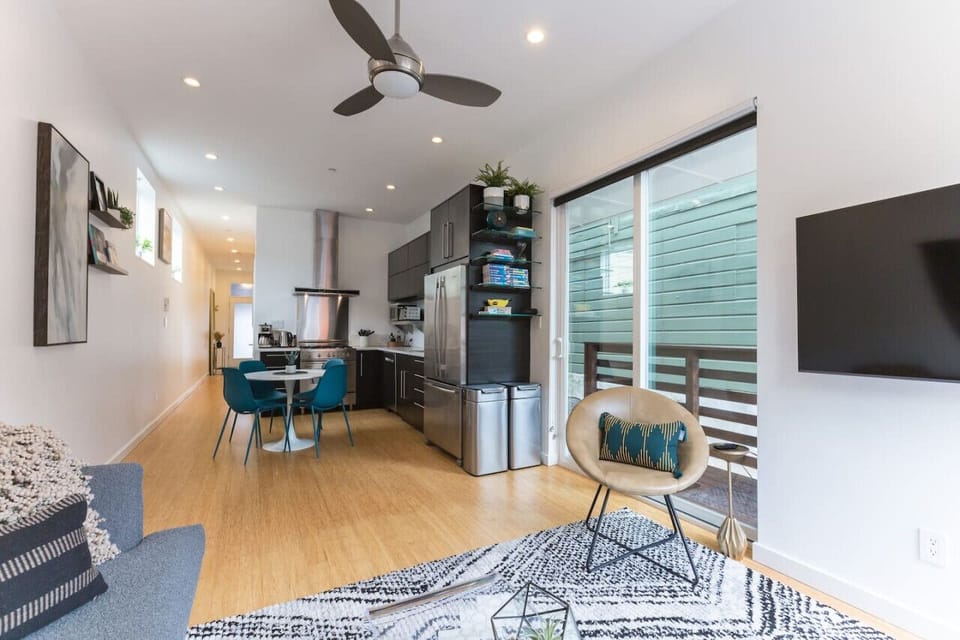 Open concept floor plan featuring Living Room, Kitchen, and Dining Area