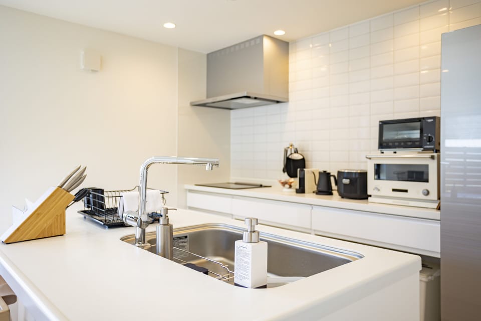 Luxury Villa | Private kitchen | Full-size fridge, microwave, oven, dishwasher
