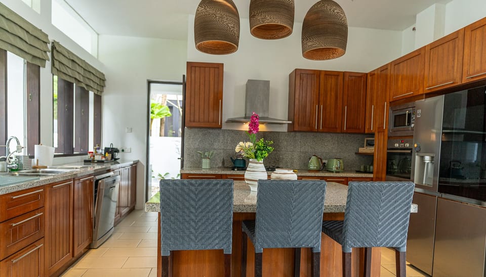 Luxury Villa | Private kitchen | Full-size fridge, microwave, oven, stovetop