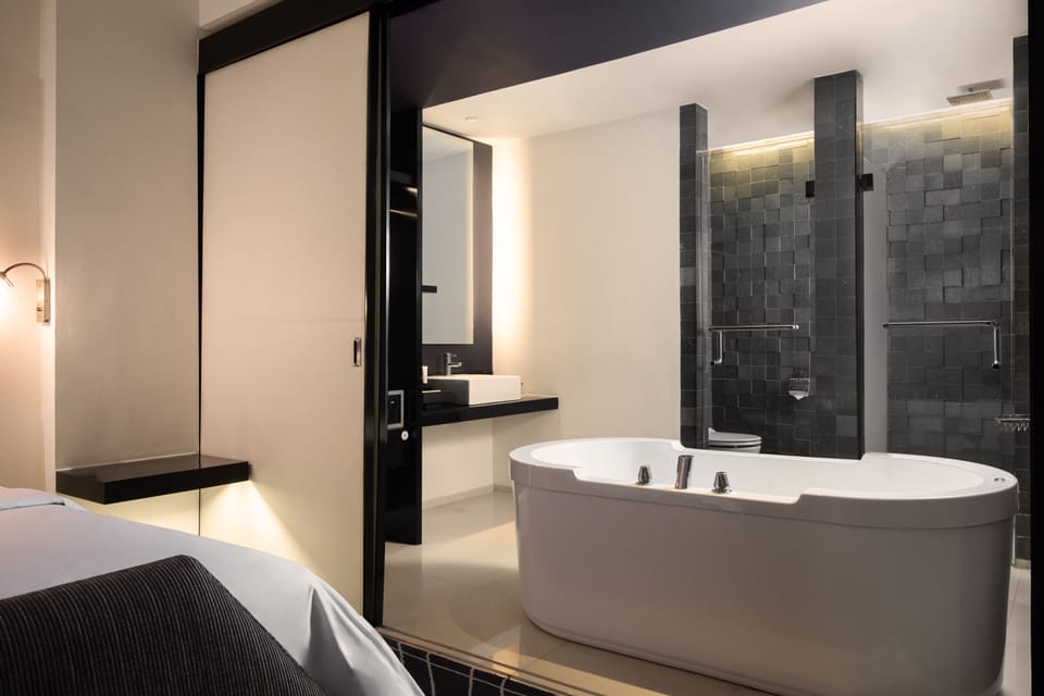 Separate tub and shower, free toiletries, slippers, towels