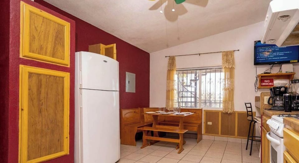 The kitchen includes an oven, microwave, and tea/coffee maker . Step outside to the private patio for al fresco dining . Located a 2-minute walk from Playa San Felipe .