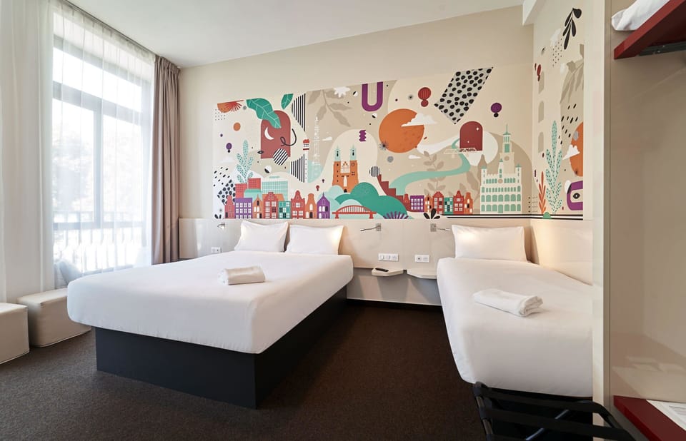 Family Triple Room, City View | Desk, laptop workspace, soundproofing, free WiFi