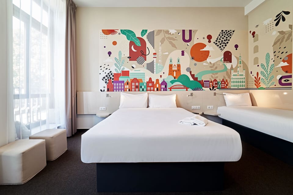 Family Triple Room, City View | Desk, laptop workspace, soundproofing, free WiFi