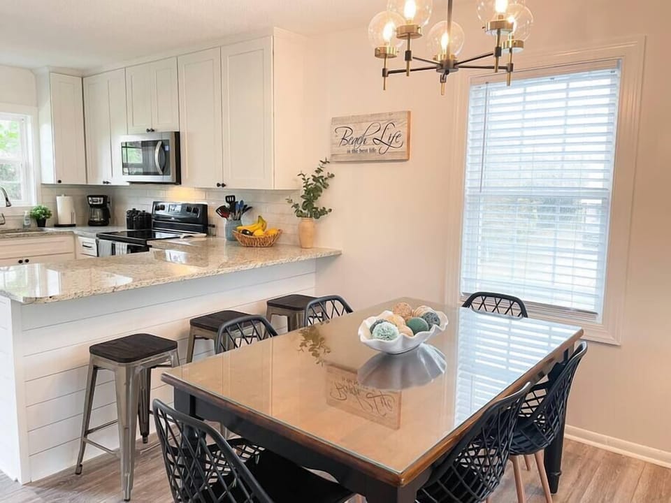 Main floor dining area and bar stool seating. 