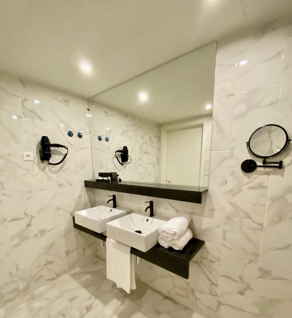 Hair dryer, towels, soap, shampoo