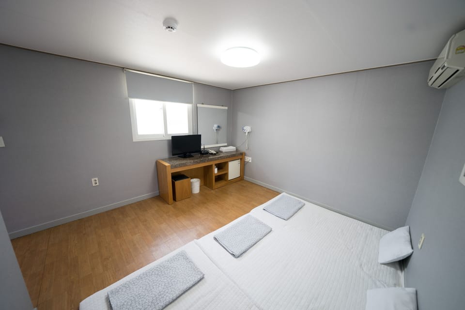 Traditional Triple Room | Blackout drapes, free WiFi, bed sheets