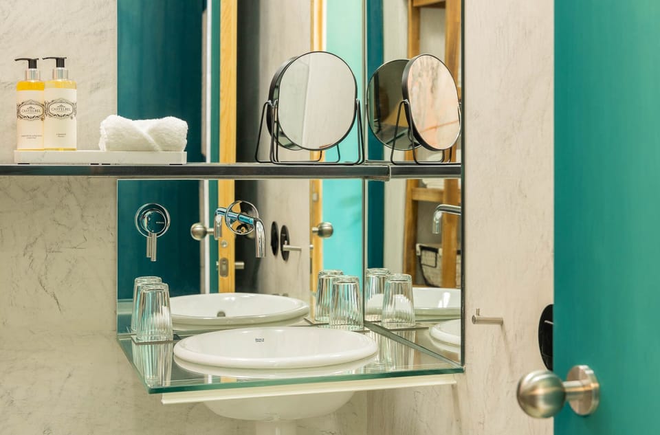 Superior Double or Twin Room | Bathroom | Shower, rainfall showerhead, hair dryer, heated floors