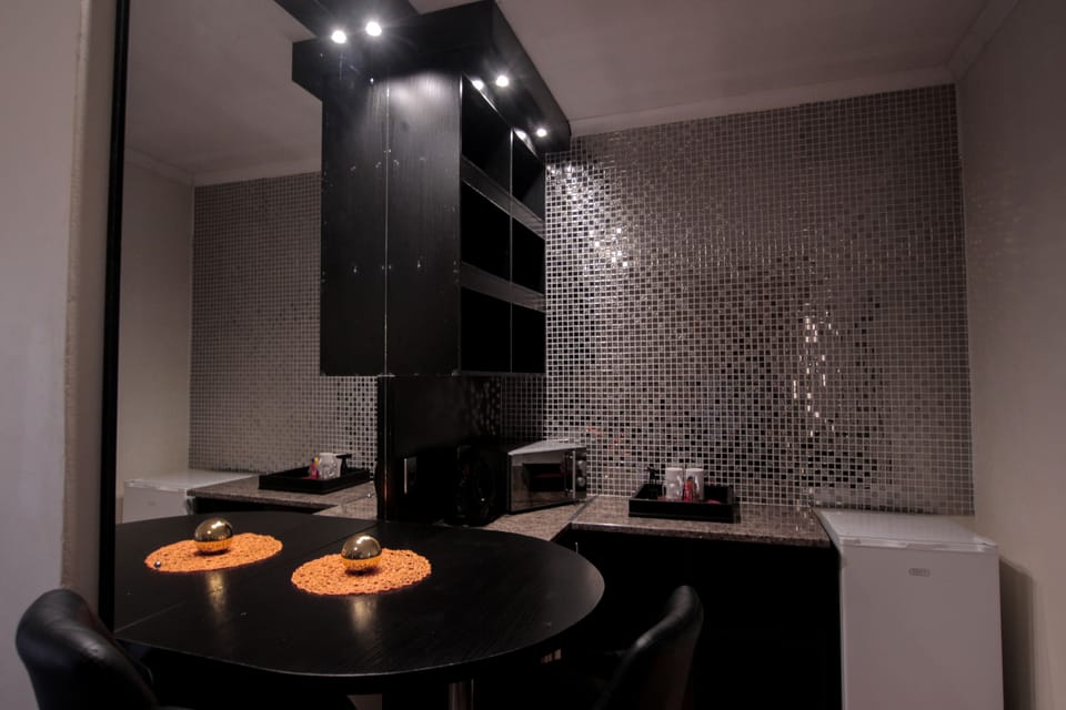 Executive Room | Private kitchenette | Coffee/tea maker, fridge, electric kettle