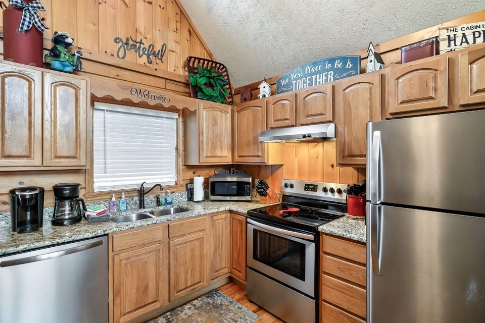 Beautifully updated kitchen that is fully stocked with all of the kitchen essentials for all your cooking needs.    