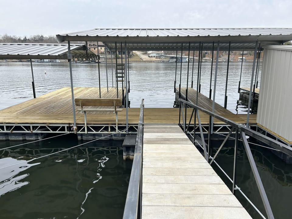 The guest slip straight in front of walk way is 12' wide x 24' deep.