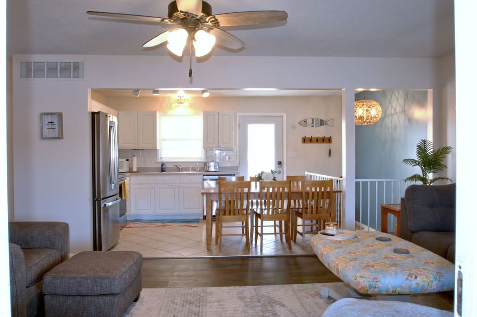 The kitchen is well supplied and features new stainless steel appliances.