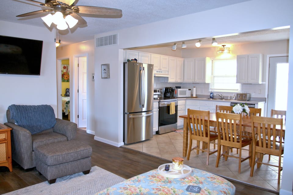 Down the hallway you'll find the upstairs bathroom and 2 king bedrooms.