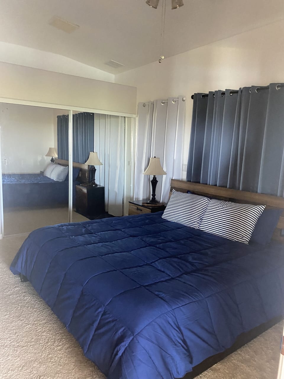 Master bedroom with king memory foam mattress, smart tv, & master bathroom 