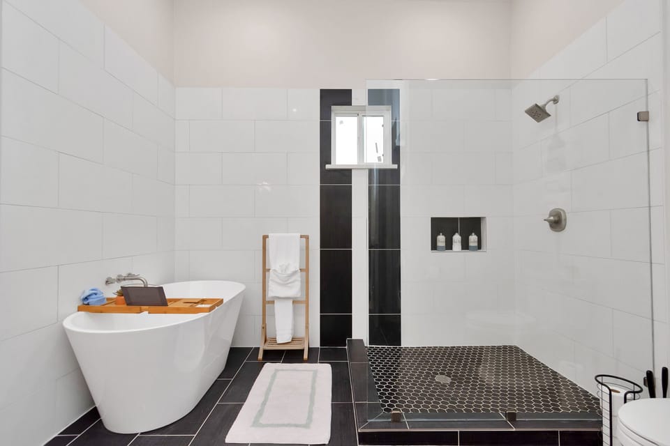 Soak in the free standing tub after a day at the beach