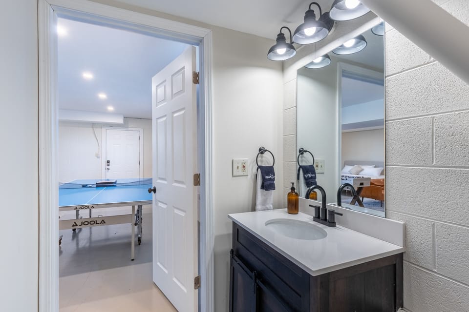 Bathroom attached to the game room.