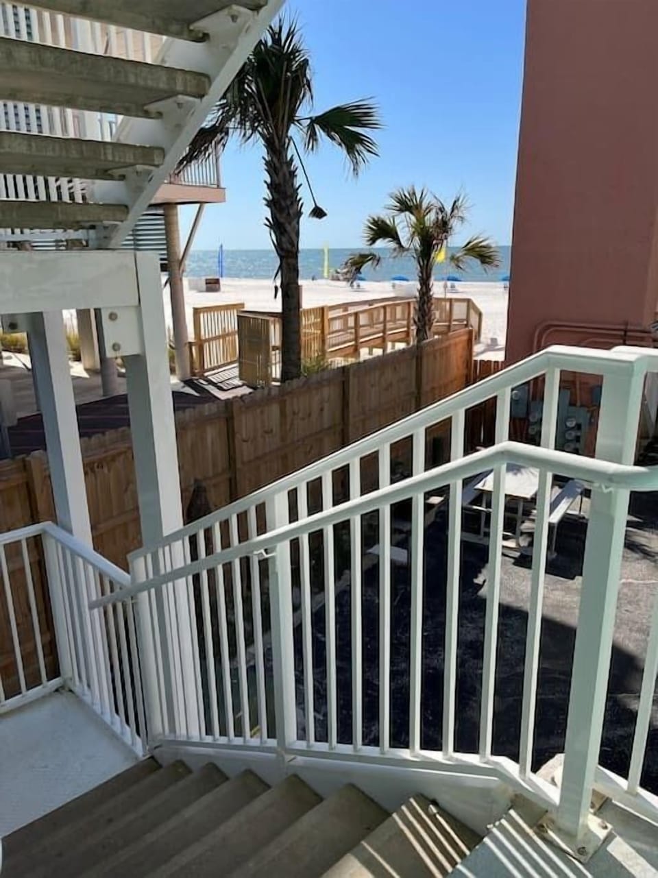 View from front door. Down one flight of stairs and a few steps to the beach.