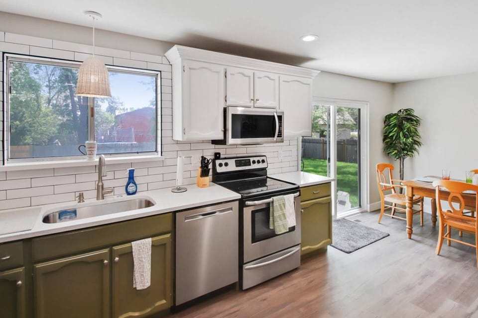 Upstairs Kitchen is Open Concept to Dining Area to Provide Open Conversation.