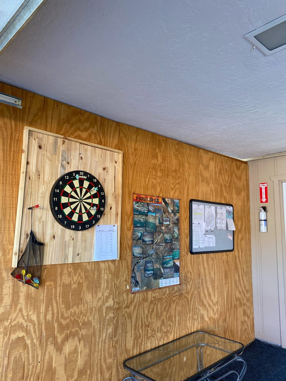 Garage access w/ Dartboard & scoring sheets . 
Local map & rules listed .