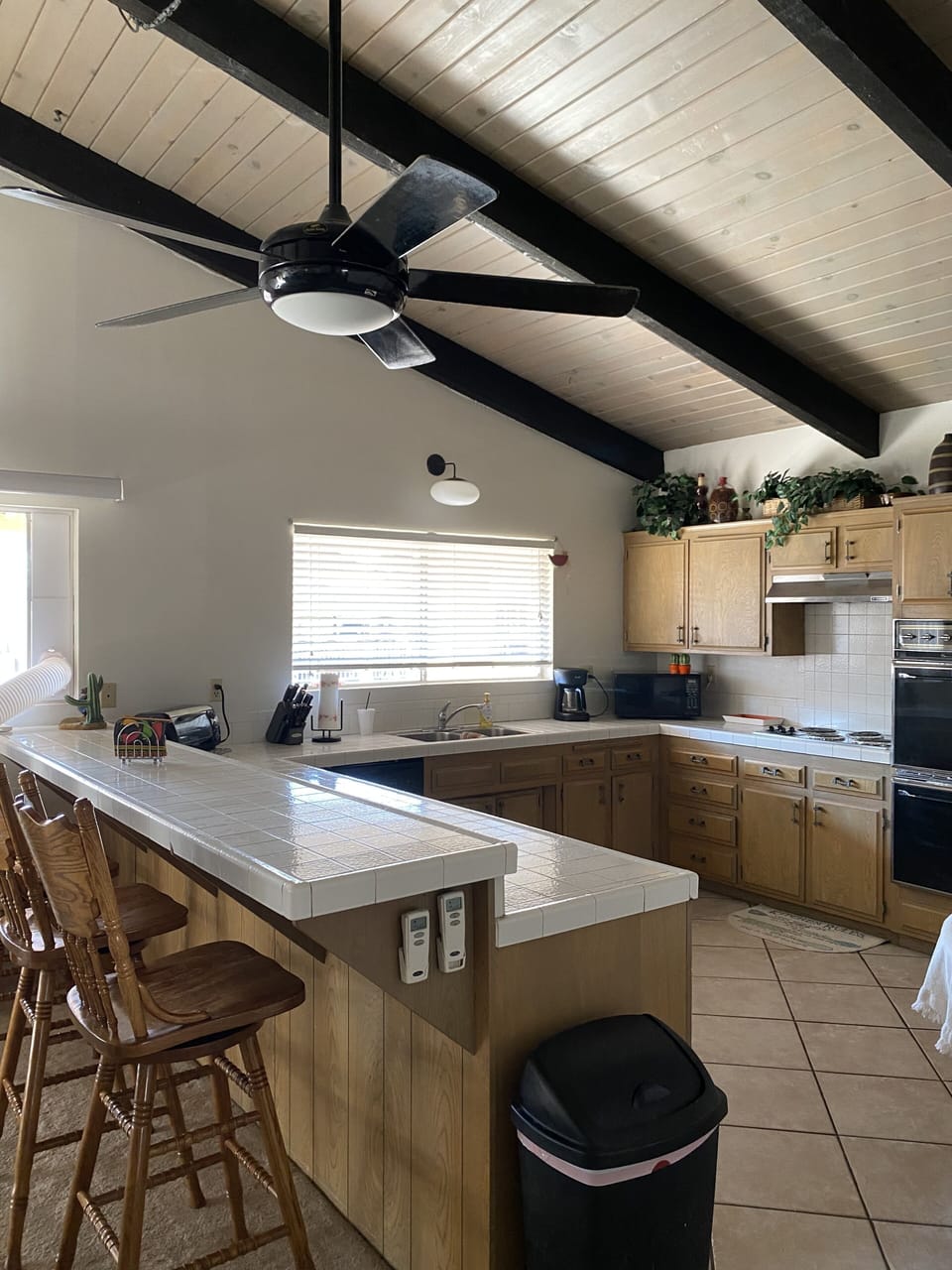 Large Kitchen & bar w/ 4 tall chairs. Dishwasher w/ all kitchen appliances. 