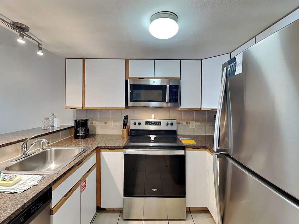 Fully Equipped Kitchen with Stainless Steel Appliances