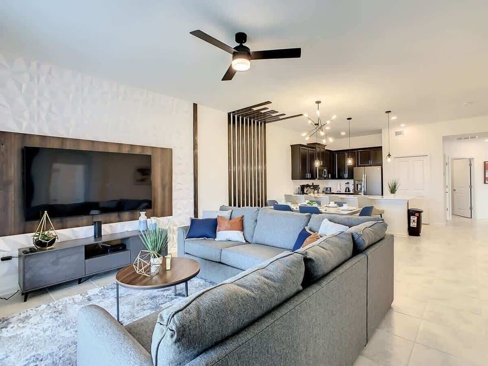 Relax on the comfy couch and enjoy the TV after a day exploring the city