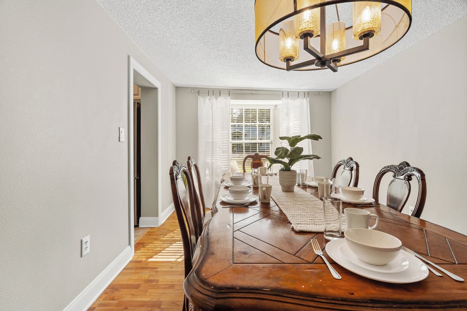 This beautiful dining room table comfortably seats 6!