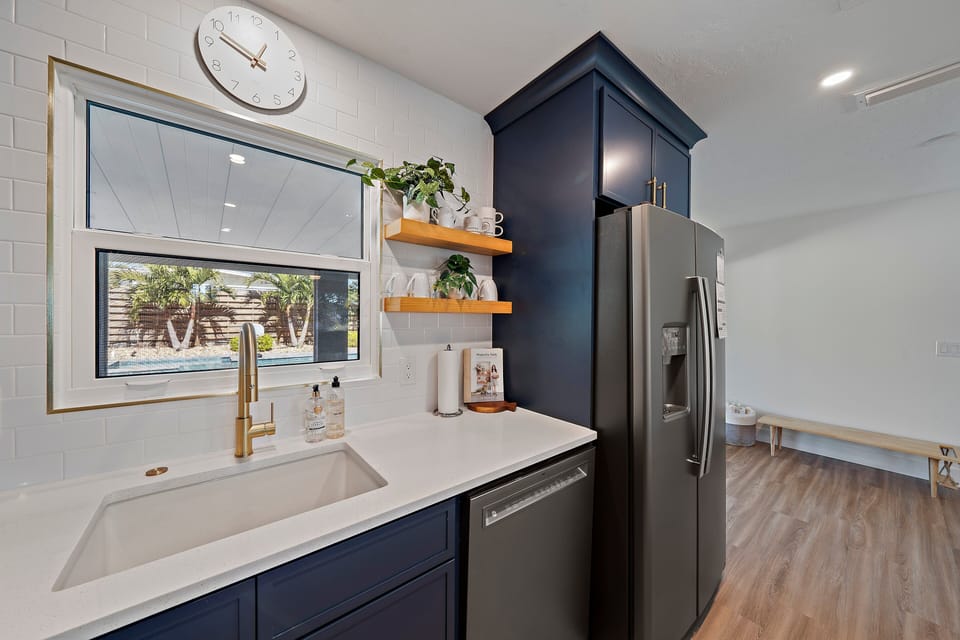 Standard appliances like dishwasher, oven, stove, toaster, and microwave are all provided.