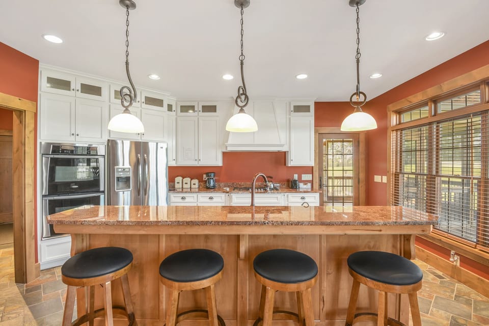 Bar area in the kitchen to enjoy breakfast meals at!