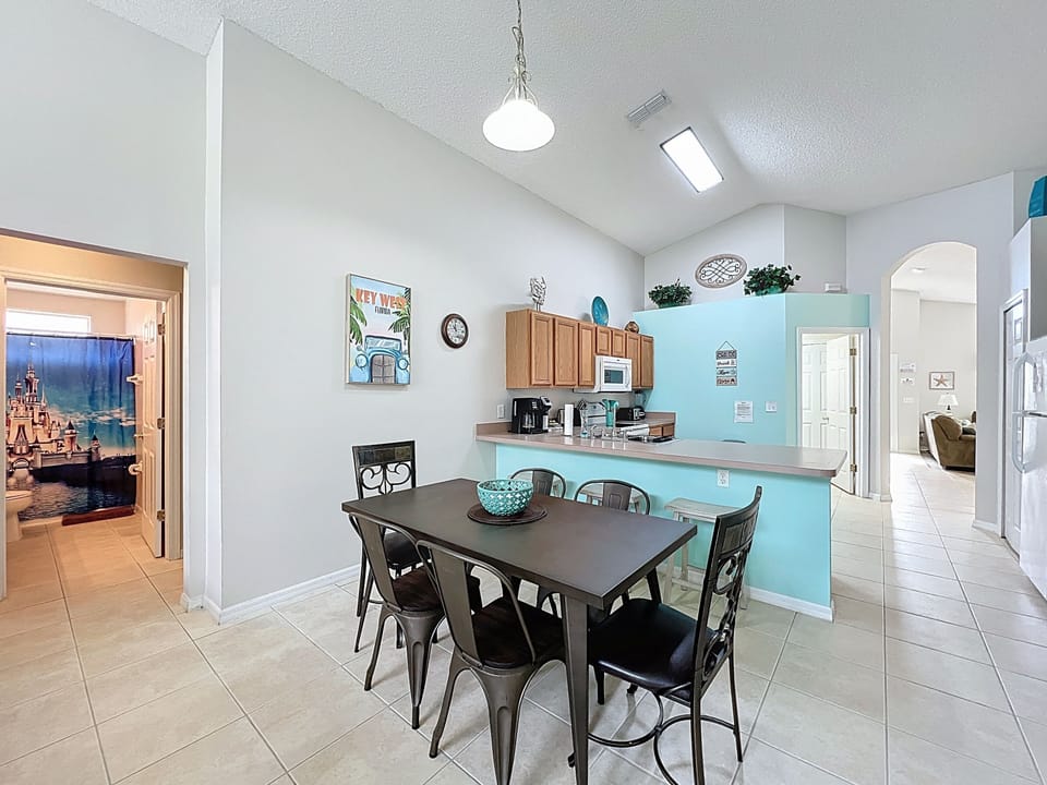 Seating for 6 at the kitchen table (3 additional seats at the counter)