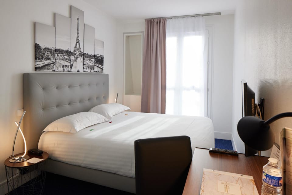 Premium bedding, desk, laptop workspace, iron/ironing board