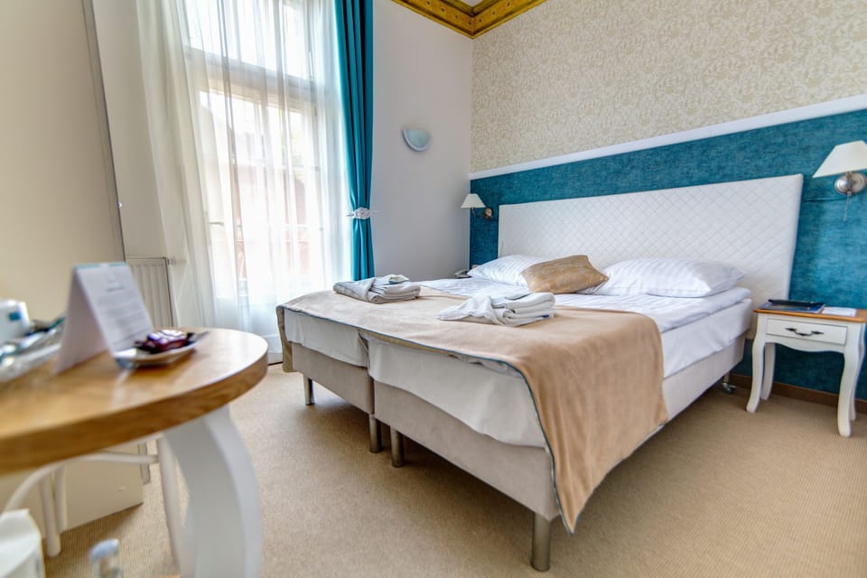 Double or Twin Room | Hypo-allergenic bedding, in-room safe, iron/ironing board, free WiFi